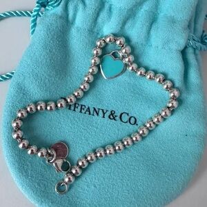 Tiffany & Co. Silver Bead Bracelet with Turquoise Heart Charm on Blue Pouch